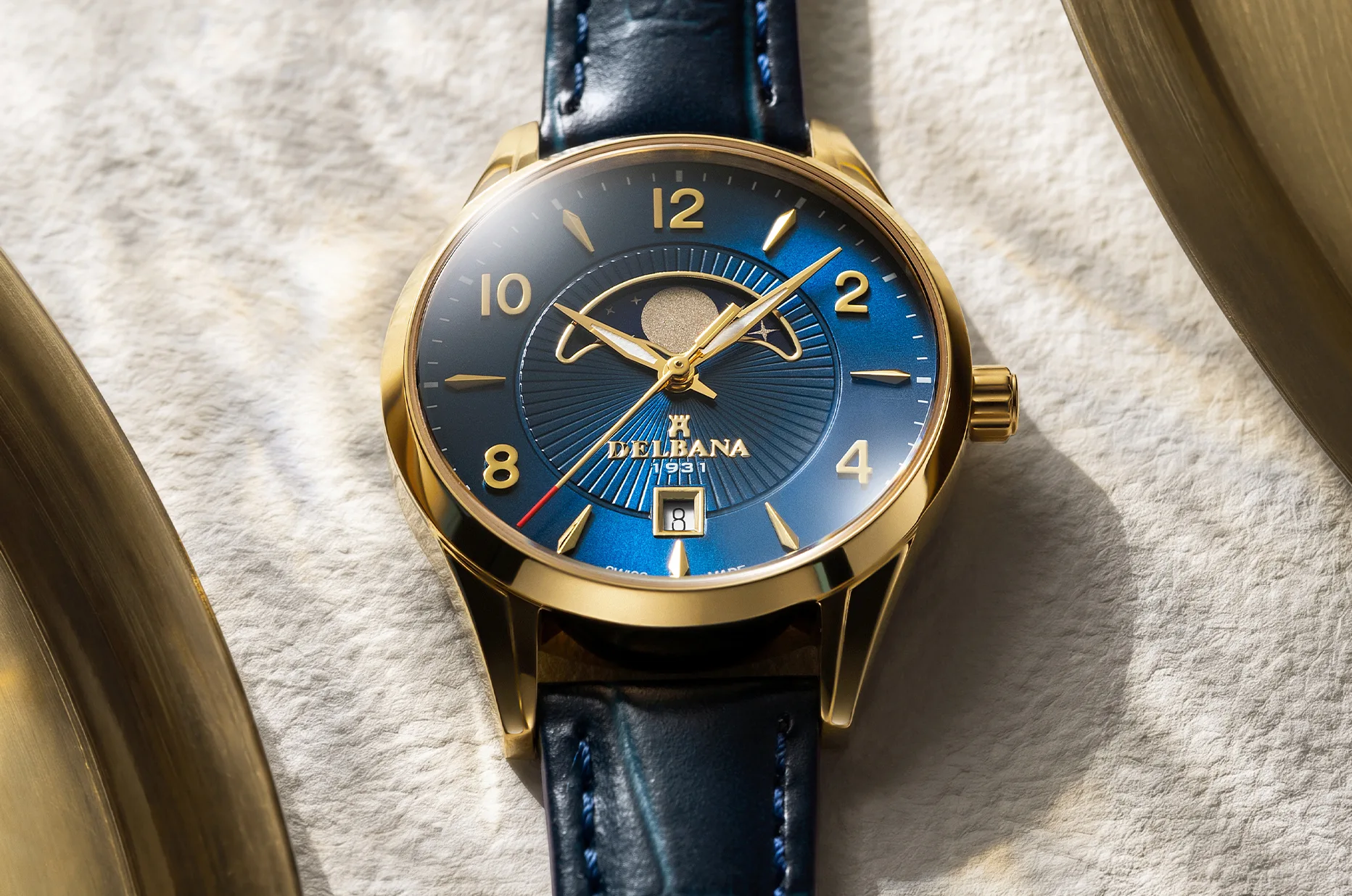 Delbana Lunetta - złocony zegarek damski z granatową tarczą, datownikiem i komplikacją Moonphase