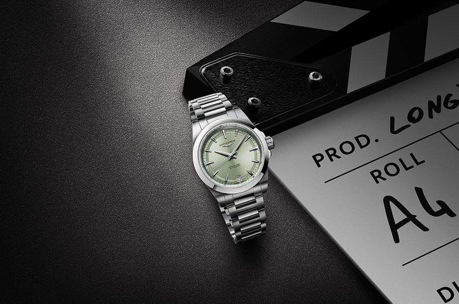 Srebrny zegarek damski z zieloną tarczą Longines Conquest