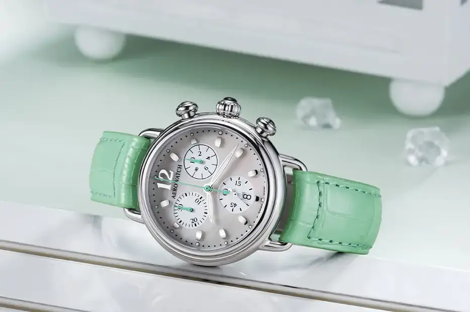 Zegarek Aerowatch Chronolady 1942 Pastel Green A 81105 AA03 z zielonym paskiem