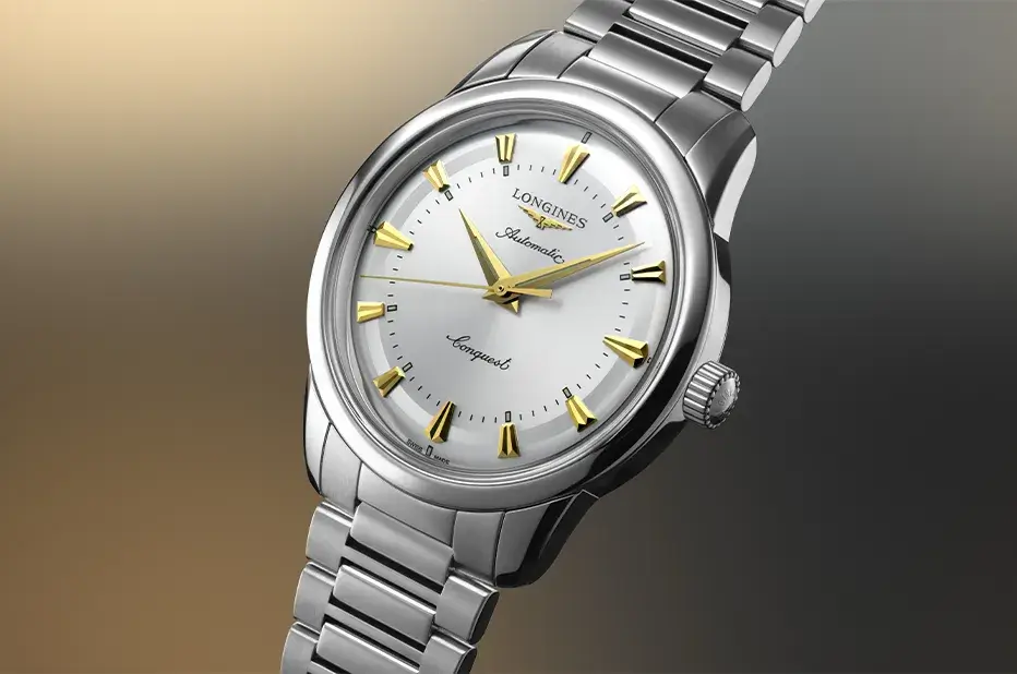 Zegarek Longines Conquest Heritage 40 mm – klasyczna elegancja w srebrnej tarczy i złotych detalach, inspirowana dziedzictwem lat 50