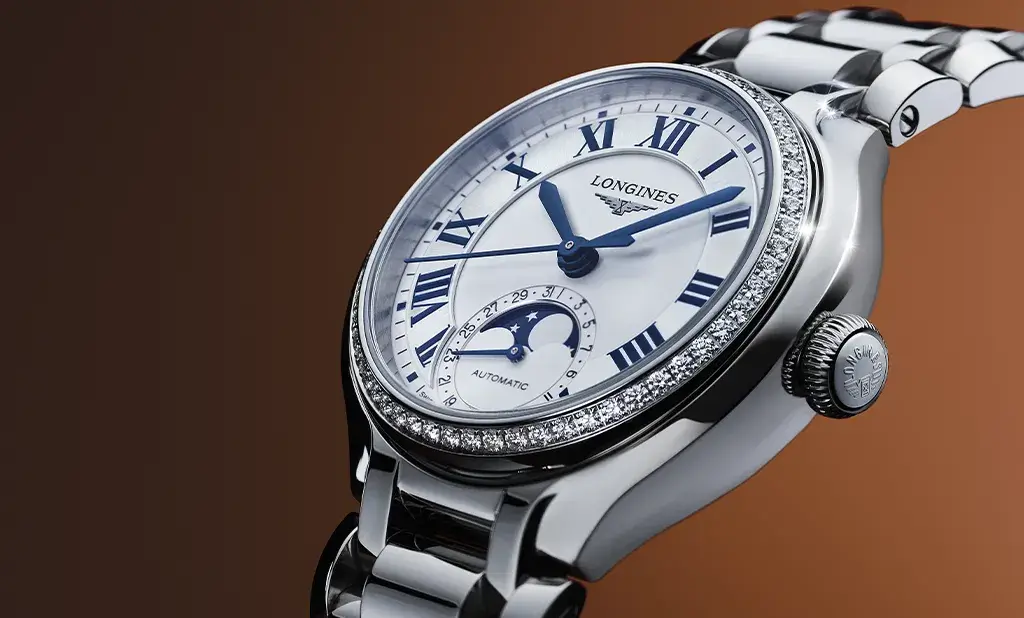 Zegarek damski Longines PrimaLuna Moonphase Automatic ze stalową bransoletą i tarczą z fazami księżyca
