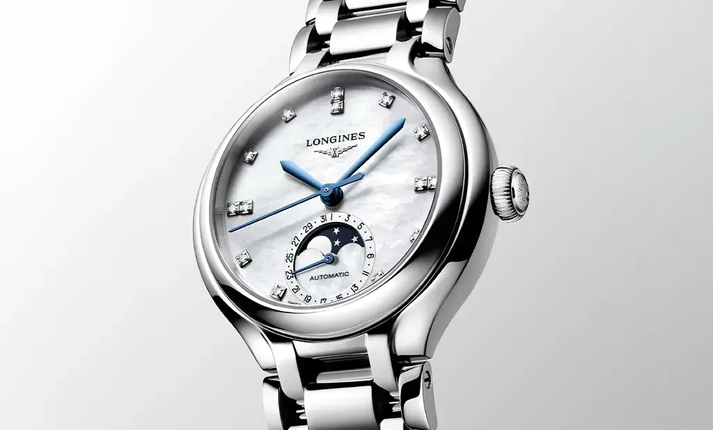 Elegancki zegarek damski Longines PrimaLuna Moonphase z tarczą z masy perłowej, brylantami i wskaźnikiem faz księżyca
