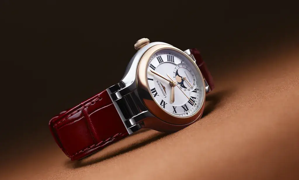 Zegarek damski Longines PrimaLuna z kopertą w kolorze różowego złota i czerwonym paskiem ze skóry aligatora