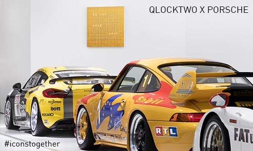 Samochody Porsche i zegary Qlocktwo