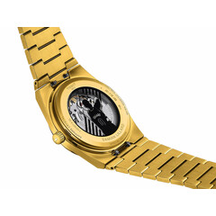 Zegarek z widocznym mechanizmem Tissot