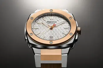 Zbliżenie na elegancką tarczę zegarka Alpina Alpiner Extreme Quartz AL-220S2AE2B z trójkątnym wzorem i detalami w kolorze różowego złota