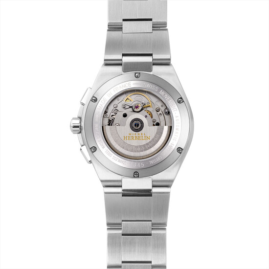 przeszklony dekiel ukazuje zdobiony mechanizm automatyczny