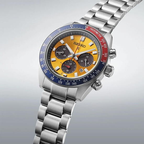 Seiko zegarek z pomarańczową tarczą