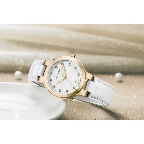 Złocona koperta i biała tarcza w zegarku Aerowatch Harmonie A 42107 JA03