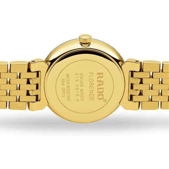 Pozłacany dekiel RADO