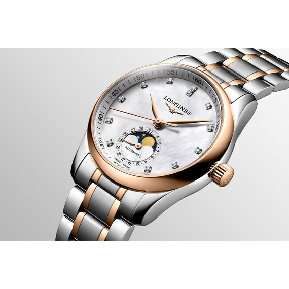 Różowo złoty bezel w zegarku Longines