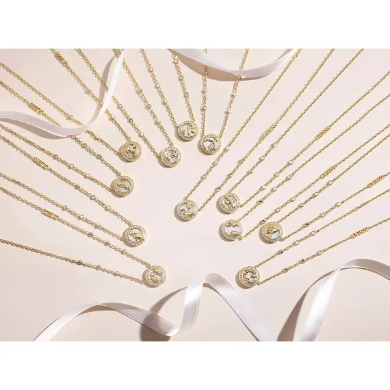 Kolekcja naszyjników zodiakalnych Guess My Sign