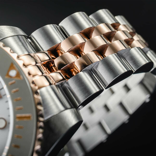 Bransoleta z elementami złoconymi w zegarku Davosa Ternos Medium Automatic 166.196.02