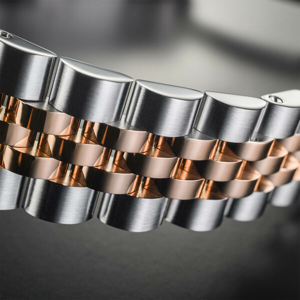 Bransoleta z elementami złoconymi w zegarku Davosa Ternos Medium Automatic 166.196.02